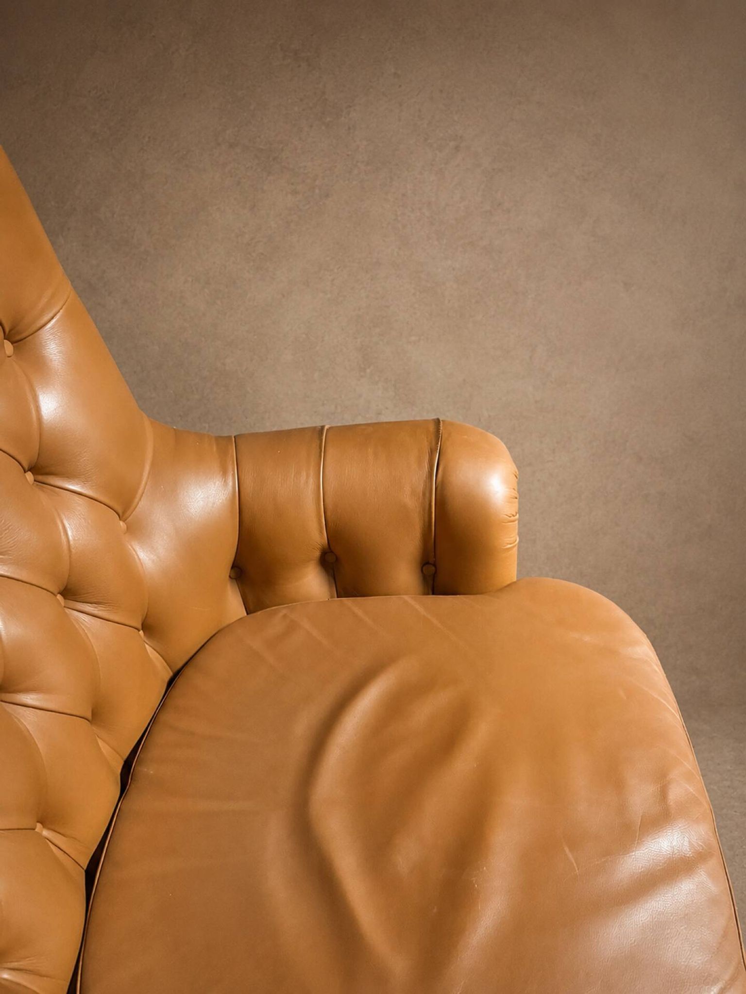 Fauteuil capitonné Poltrona Frau circé 1990
