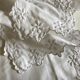 Pair of percale pillowcases embroidered festoons and daisies 1960