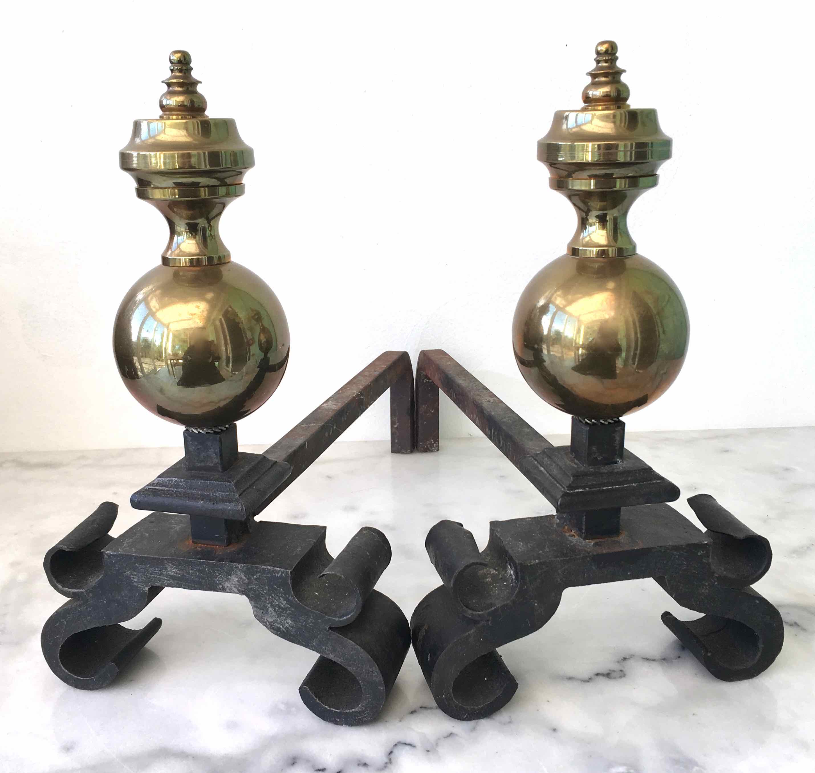 Old cast iron and brass bedside tables