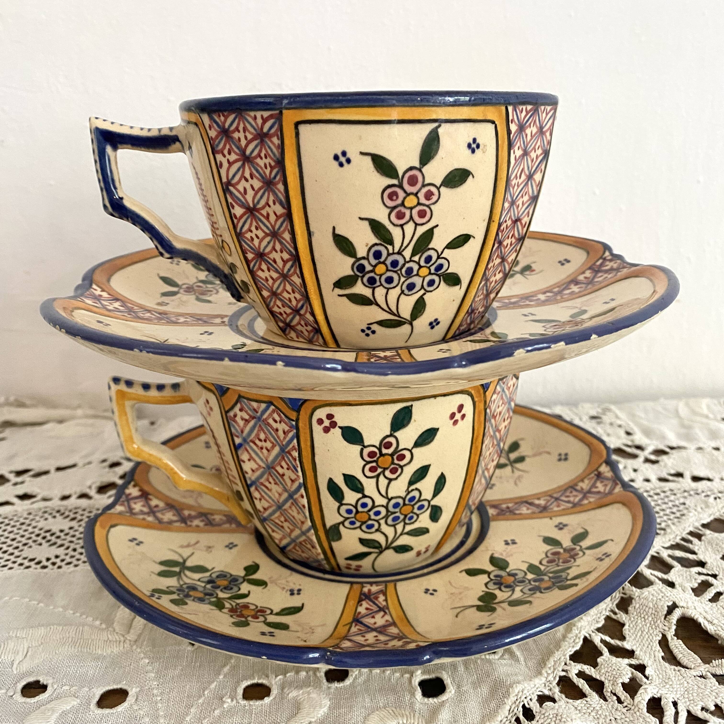 Antique Quimper Henriot earthenware cups and saucers