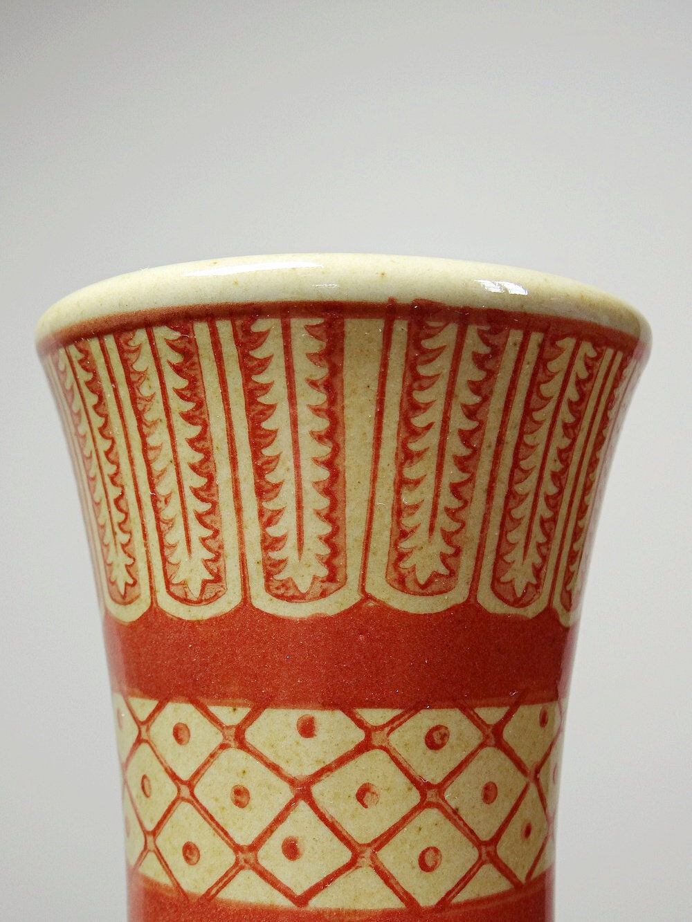 20th century Chinese vase, hand-painted ceramic in an unusual red hue.