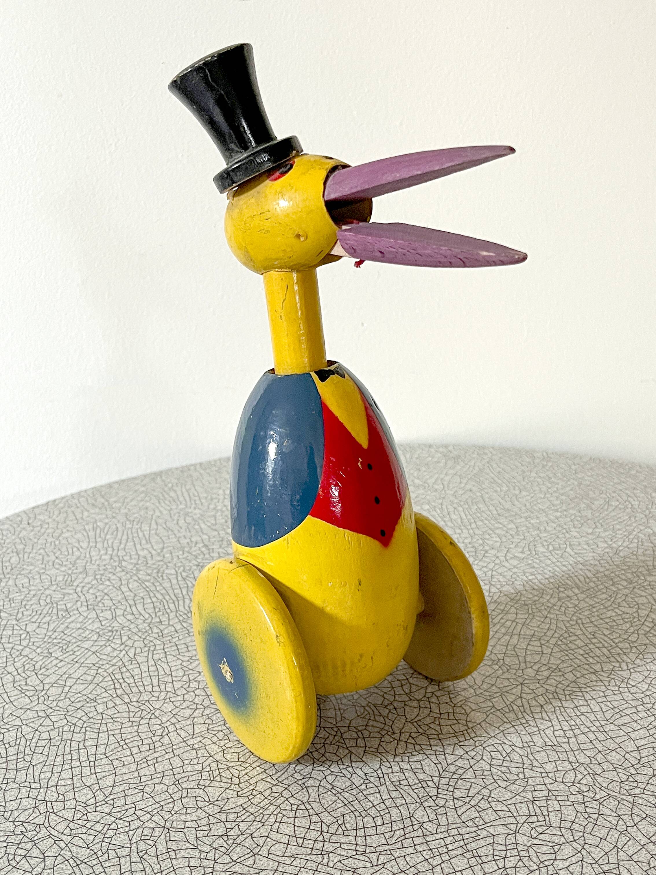 Old push toy, wooden stork