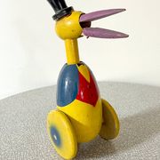 Ancien jouet à pousser, cigogne en bois