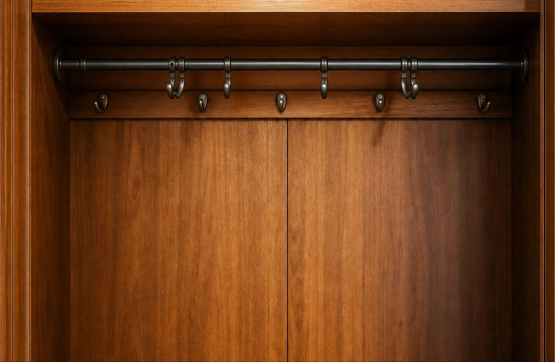 Antique walnut burl wardrobe with central mirror and large drawer.