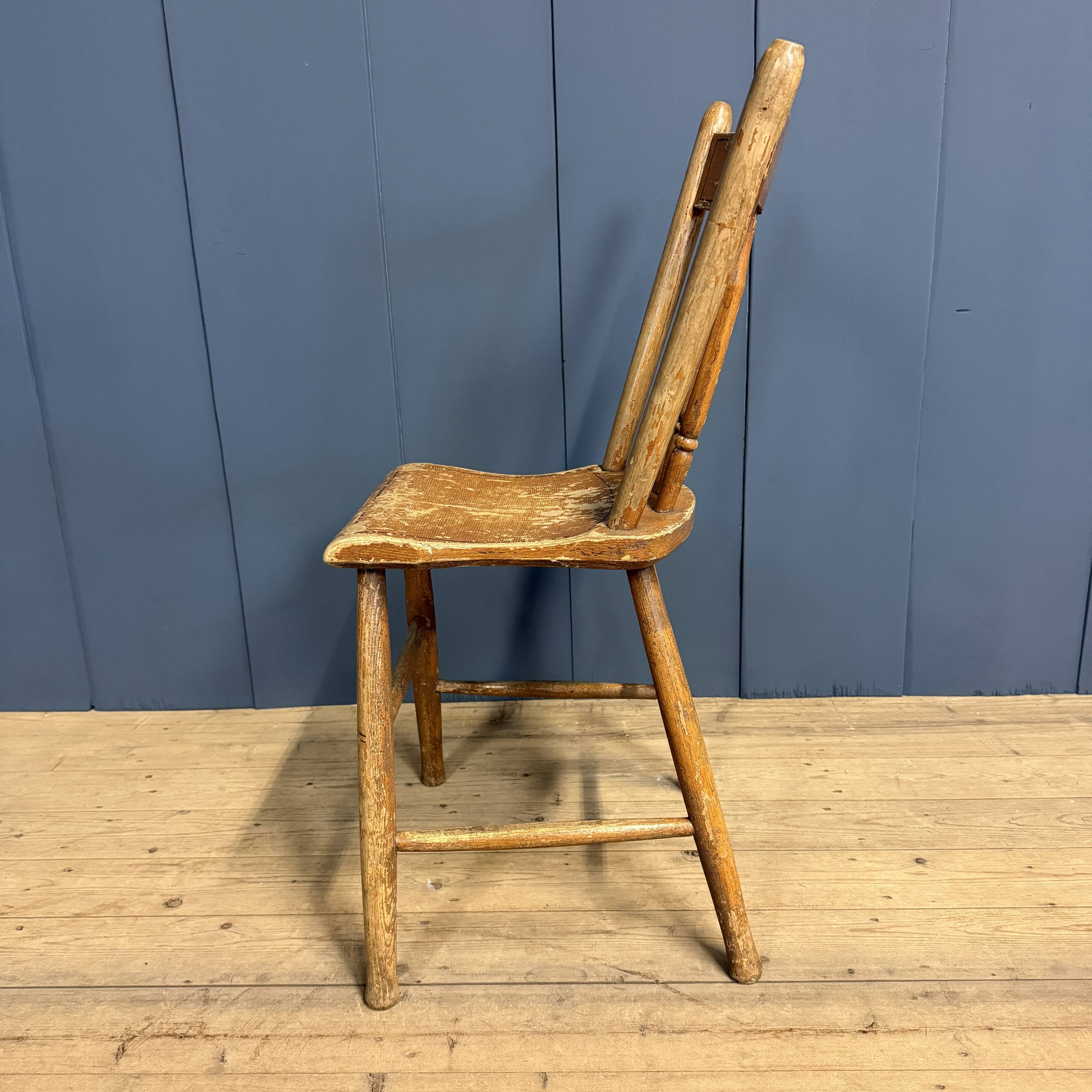 Set of four painted Dutch kitchen chairs.