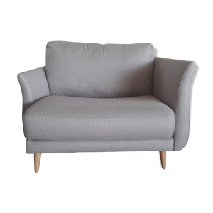 Fauteuil avec accoudoirs dissymétriques