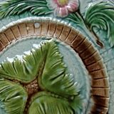 Polychrome slipware dessert plate, with a floral decoration, early 20th century.