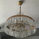 Old brass chandelier and crystal grapevines