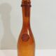Amber bottle in bubbled blown glass, signed Biot – France, vintage 1970s