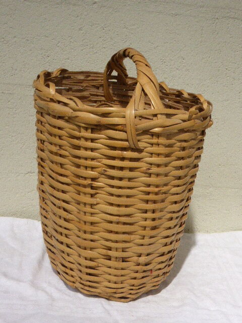 Basket has handles, braided vintage