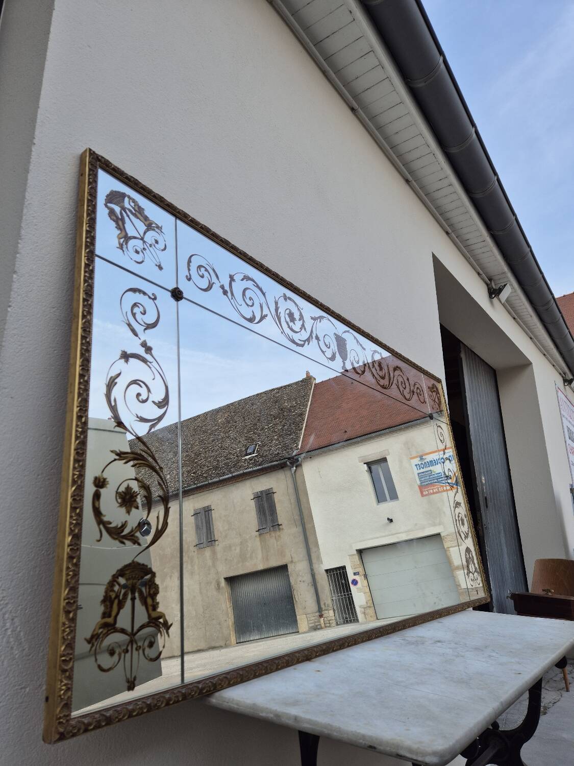 Antique gilded Venetian brasserie mirror in eglomised glass
