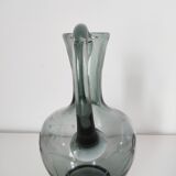Engraved glass pitcher