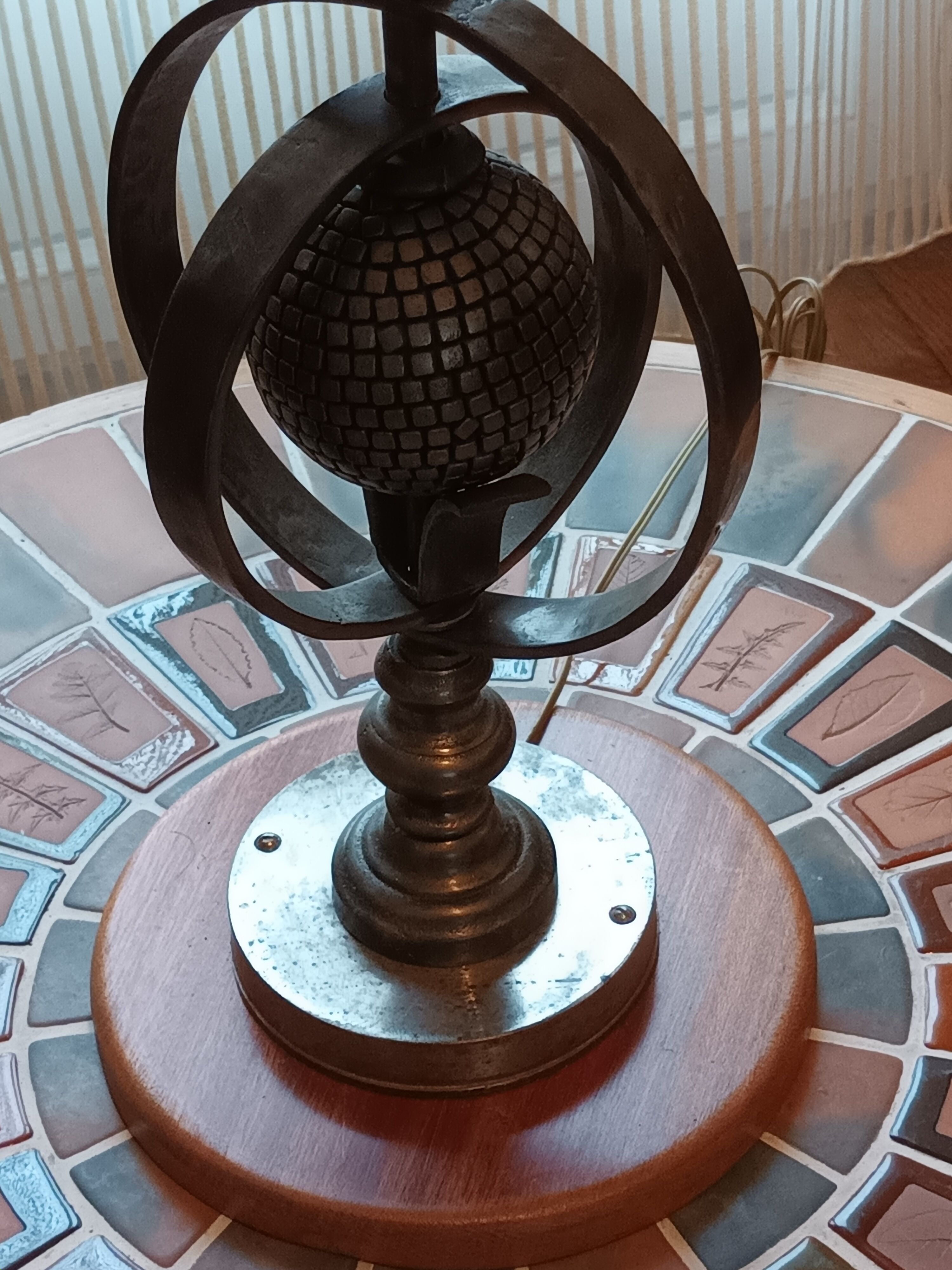 Wrought iron lamp with armillary sphere decorations