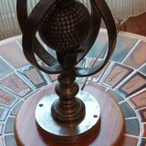 Wrought iron lamp with armillary sphere decorations