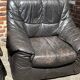 Pair of patinated leather club armchairs