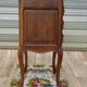 Louis XV bedside table in walnut, 3 drawers, raised edges on the tops.