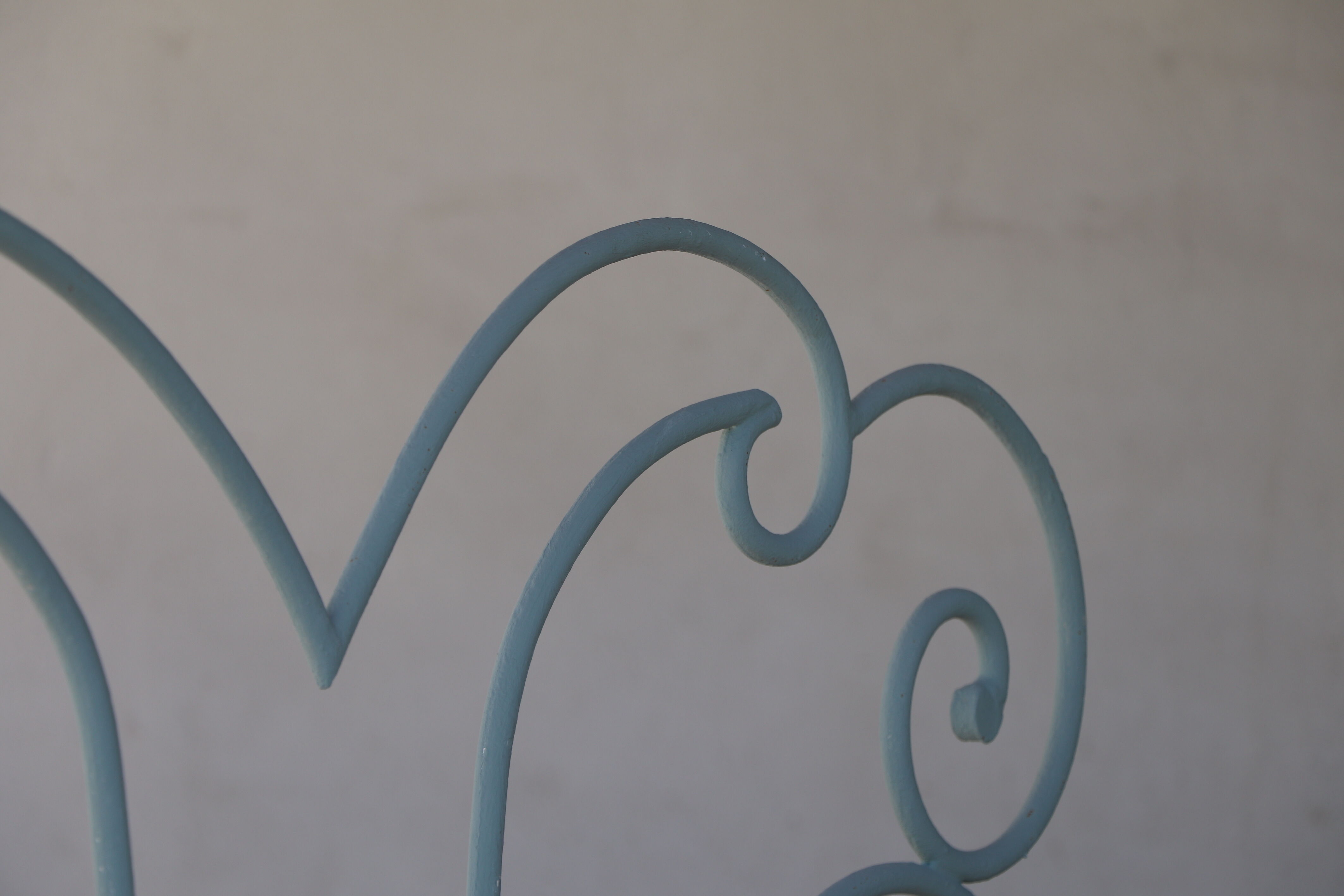 Volute wrought iron bed