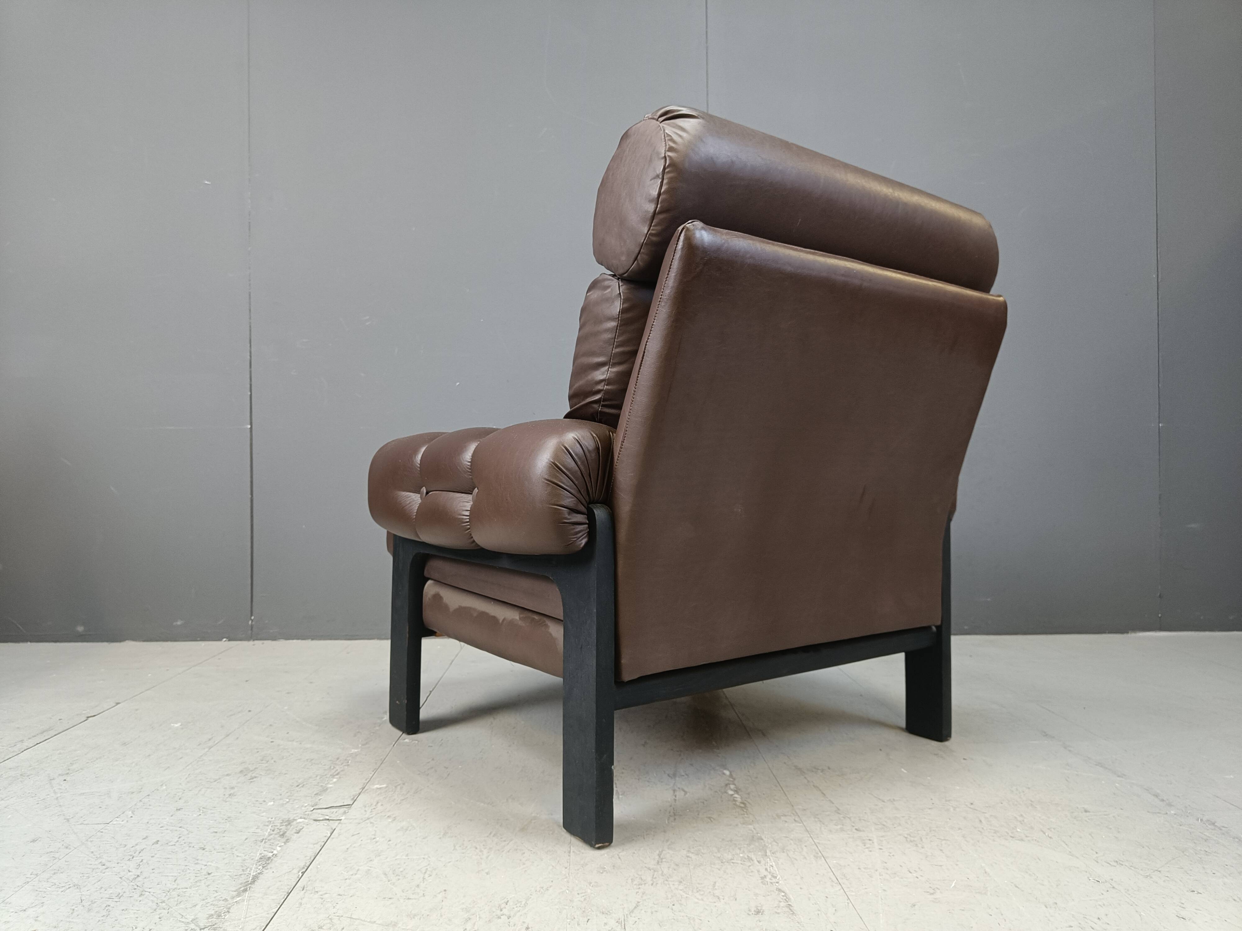 Pair of leather armchairs made in Denmark, 1960s