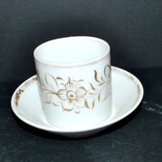 Paris porcelain coffee cup with floral design, antique porcelain with gold trim.