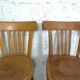4 mismatched signed bistro chairs