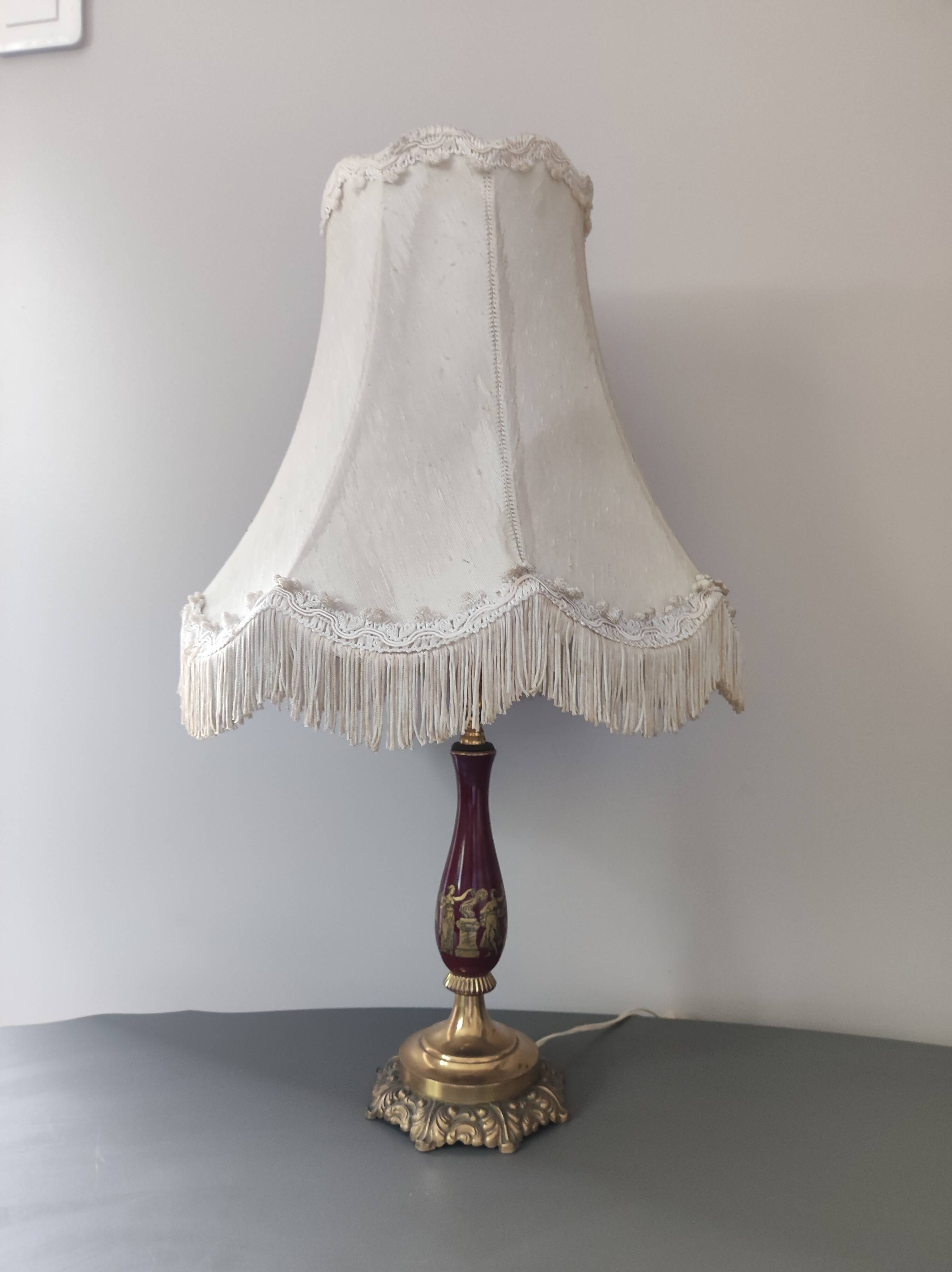 Chiseled bronze foot lamp