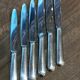 6 large silver metal knives