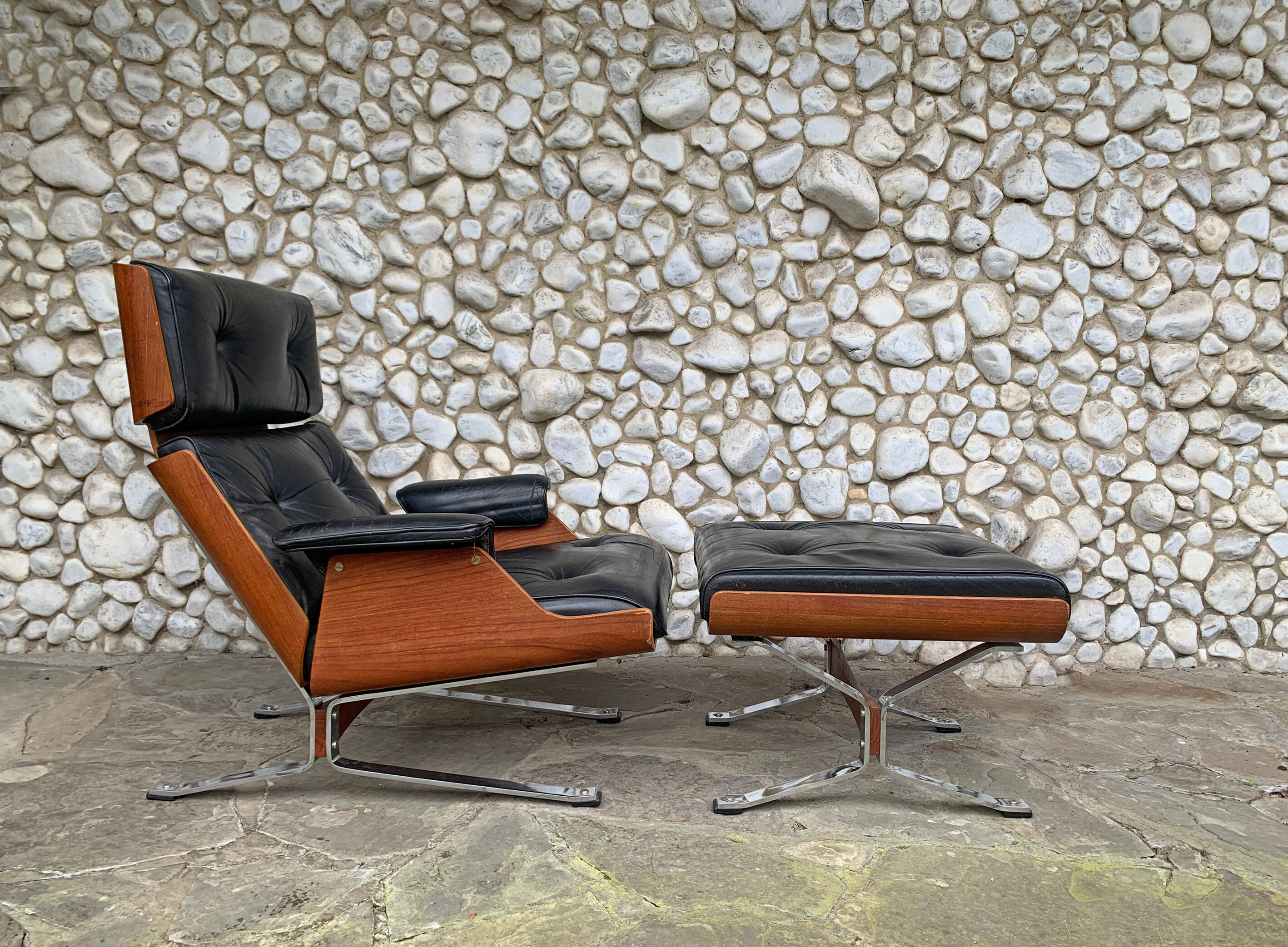 Lounge chair and ottoman black leather and teak multiplex, 1960