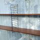 Vintage modular shelf in teak veneer and black metal, Nisse Strinning, 60s