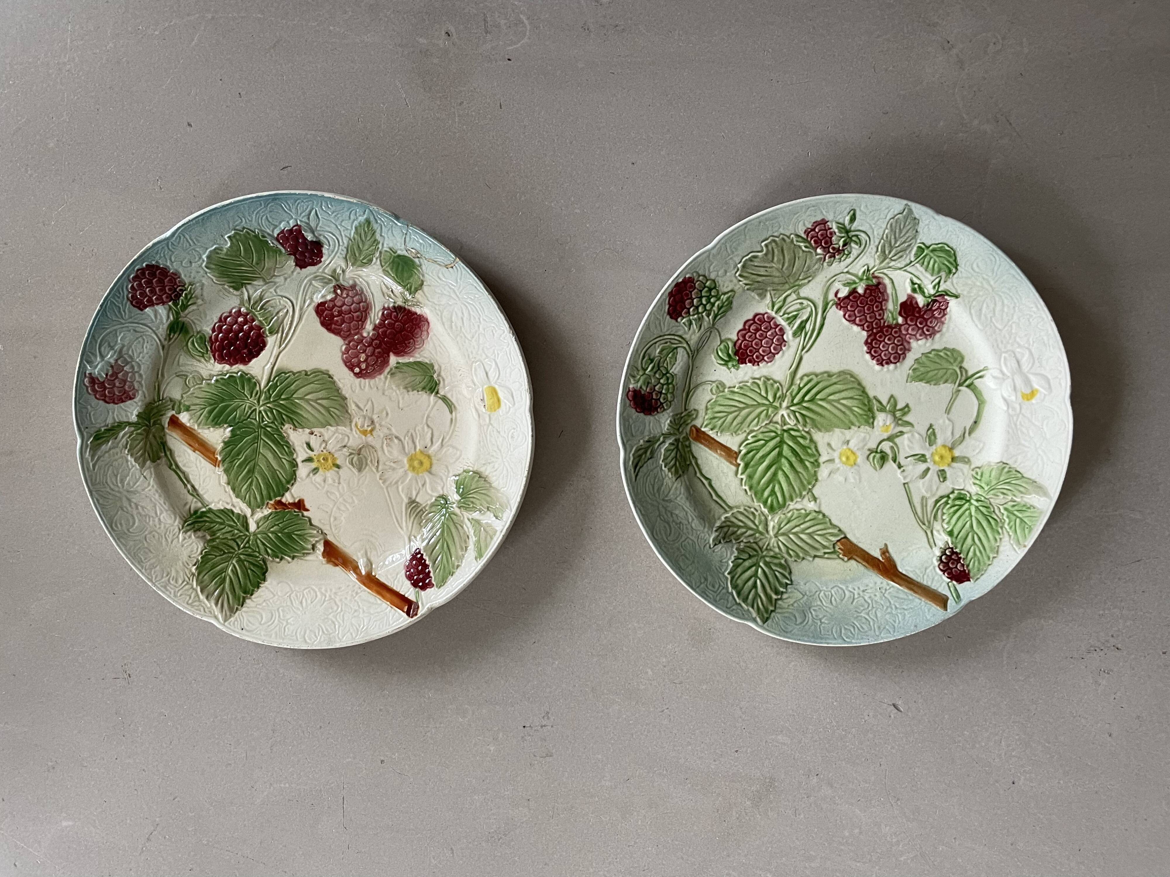 Set of 2 old Saint Clément slip plates