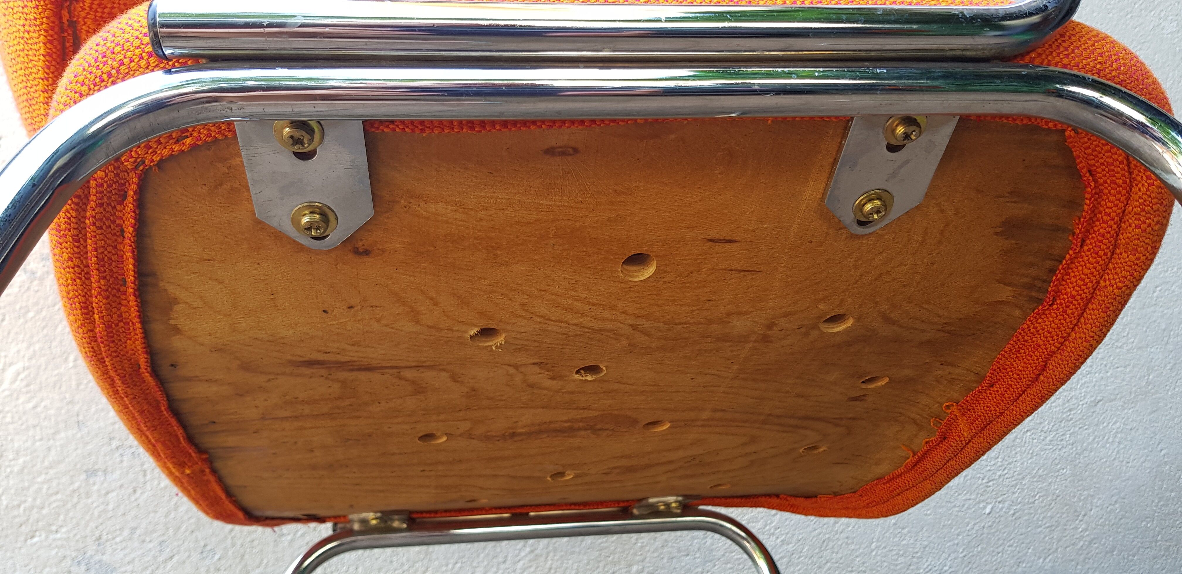 Orange fabrics and chrome armchair 70