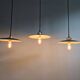 Trio of large industrial suspensions in green enamelled sheet metal.