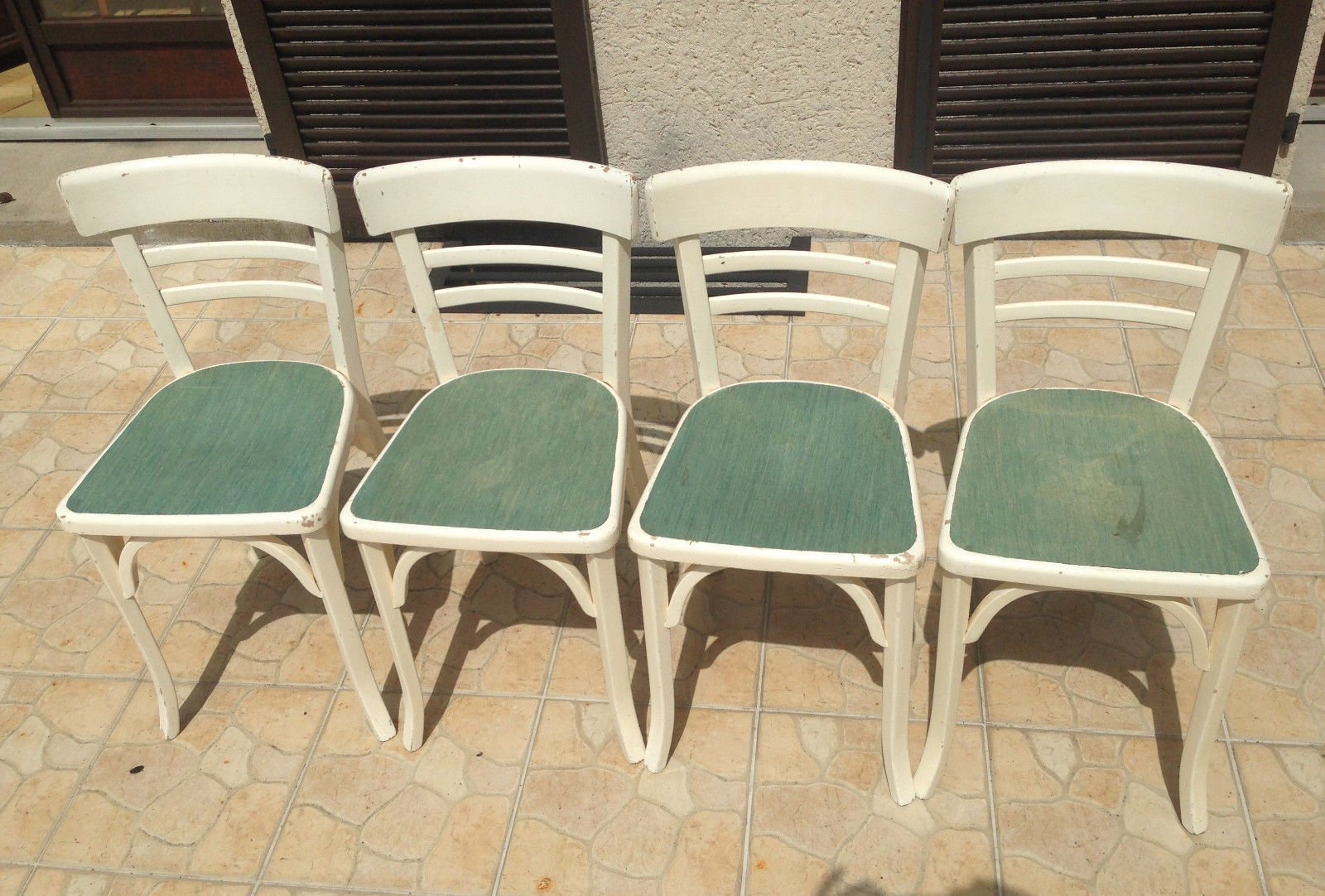 Ensemble de 4 chaises bistrot anciennes des années 50