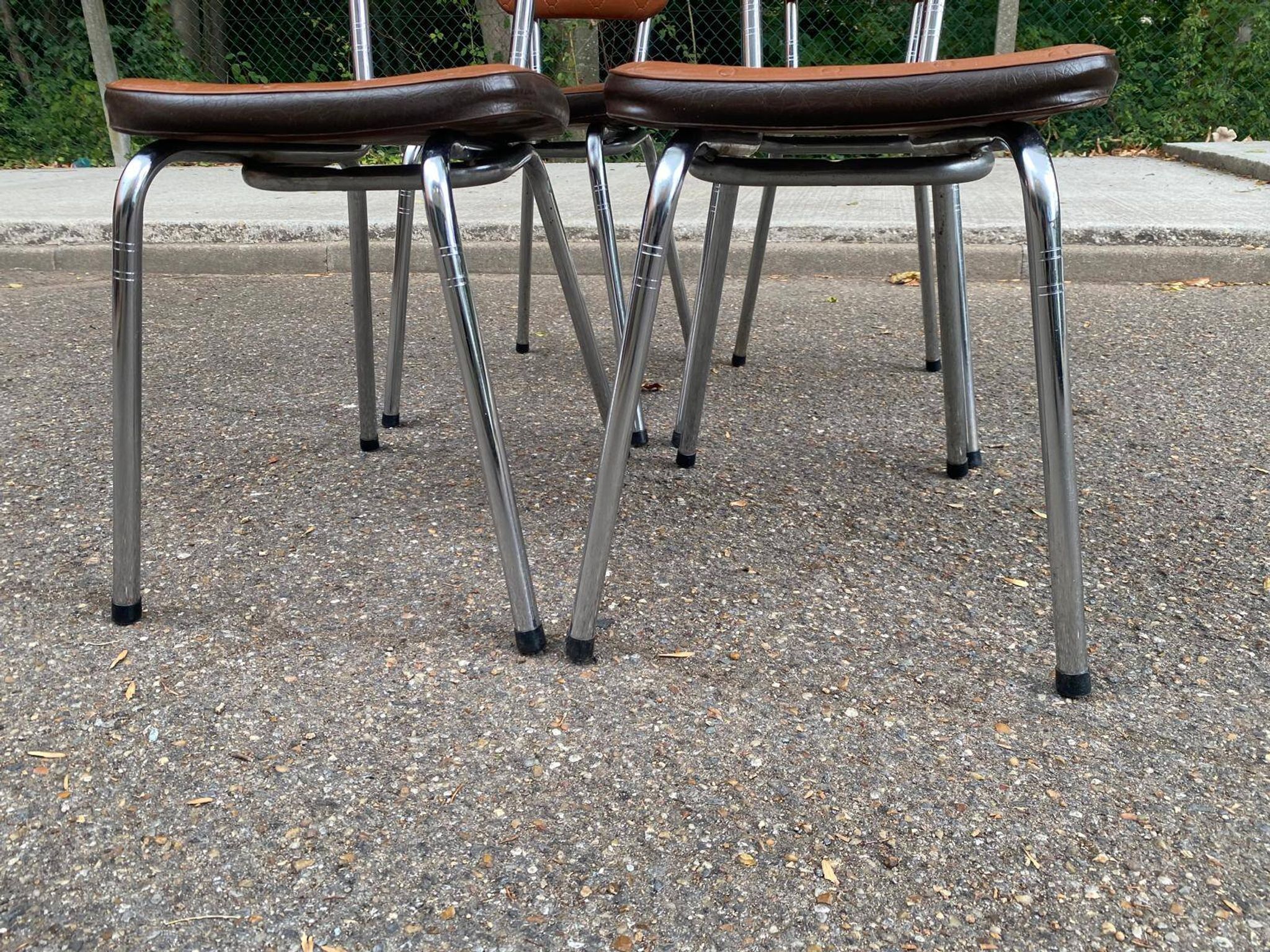 Set of 4 vintage camel faux leather quilted chairs with chrome metal by Soudexvinyl from the 70s.