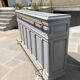 Grey lacquered wooden bar cabinet, golden brass bar