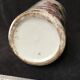 Small vase roll decoration birds branches of cherry blossoms and flowers