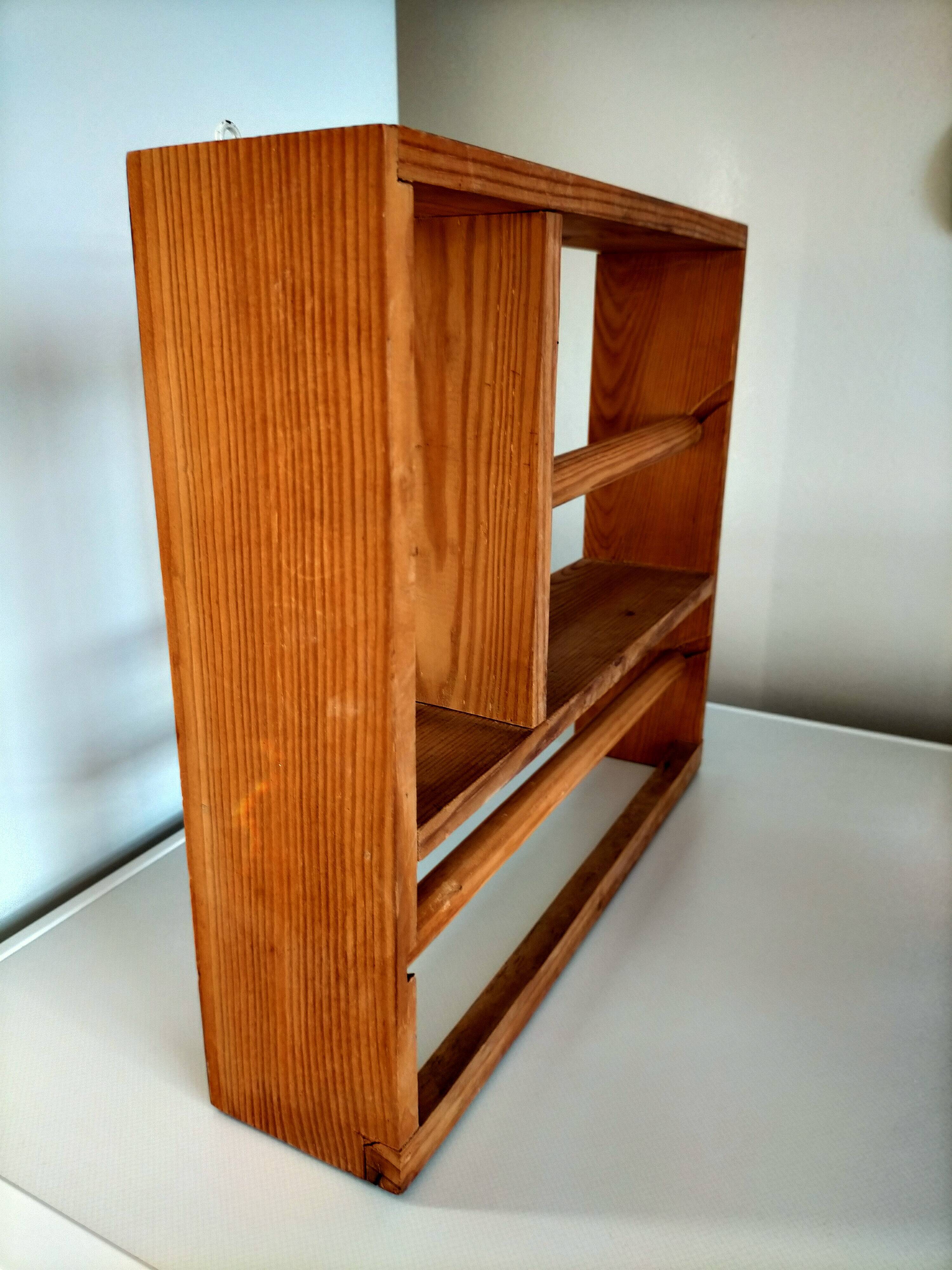 Wooden shelf with unroller wipes everything