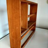 Wooden shelf with unroller wipes everything