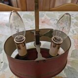 Old silver-plated bronze lamp, except for the arms which are not silver.