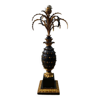 Large pineapple table lamp in carved black and gold wood, France, early 20th century.