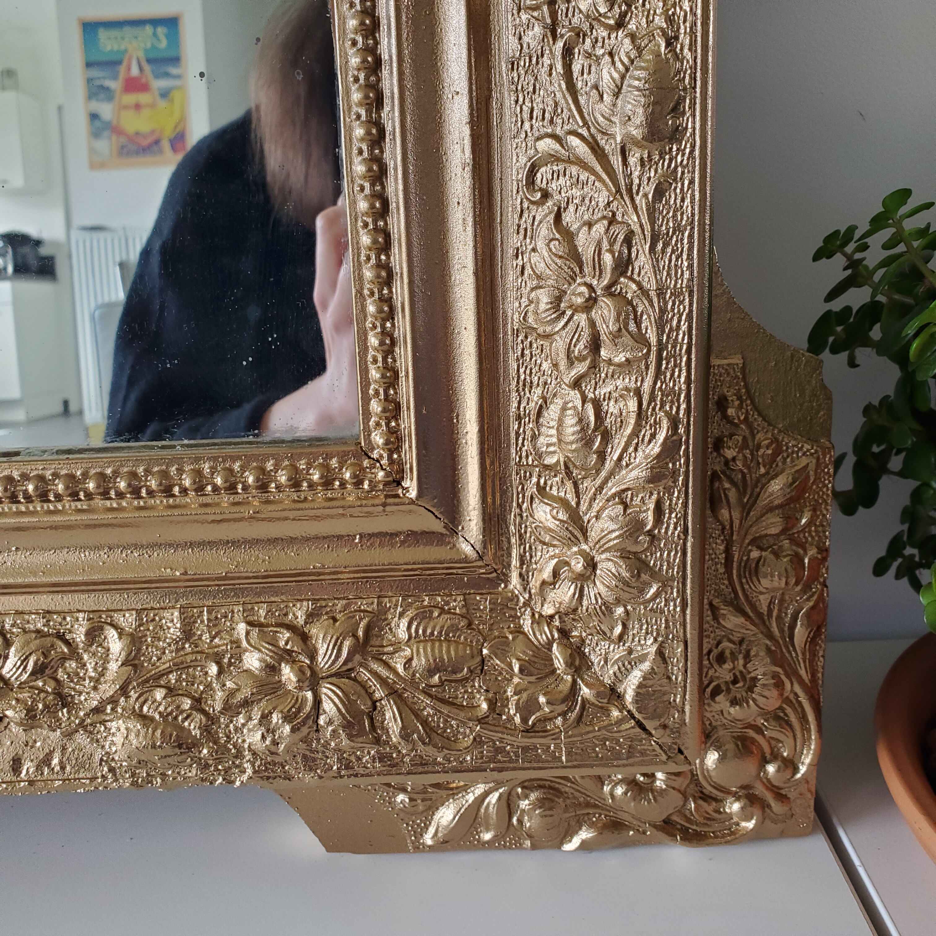 Antique mirror with gilded wood crests