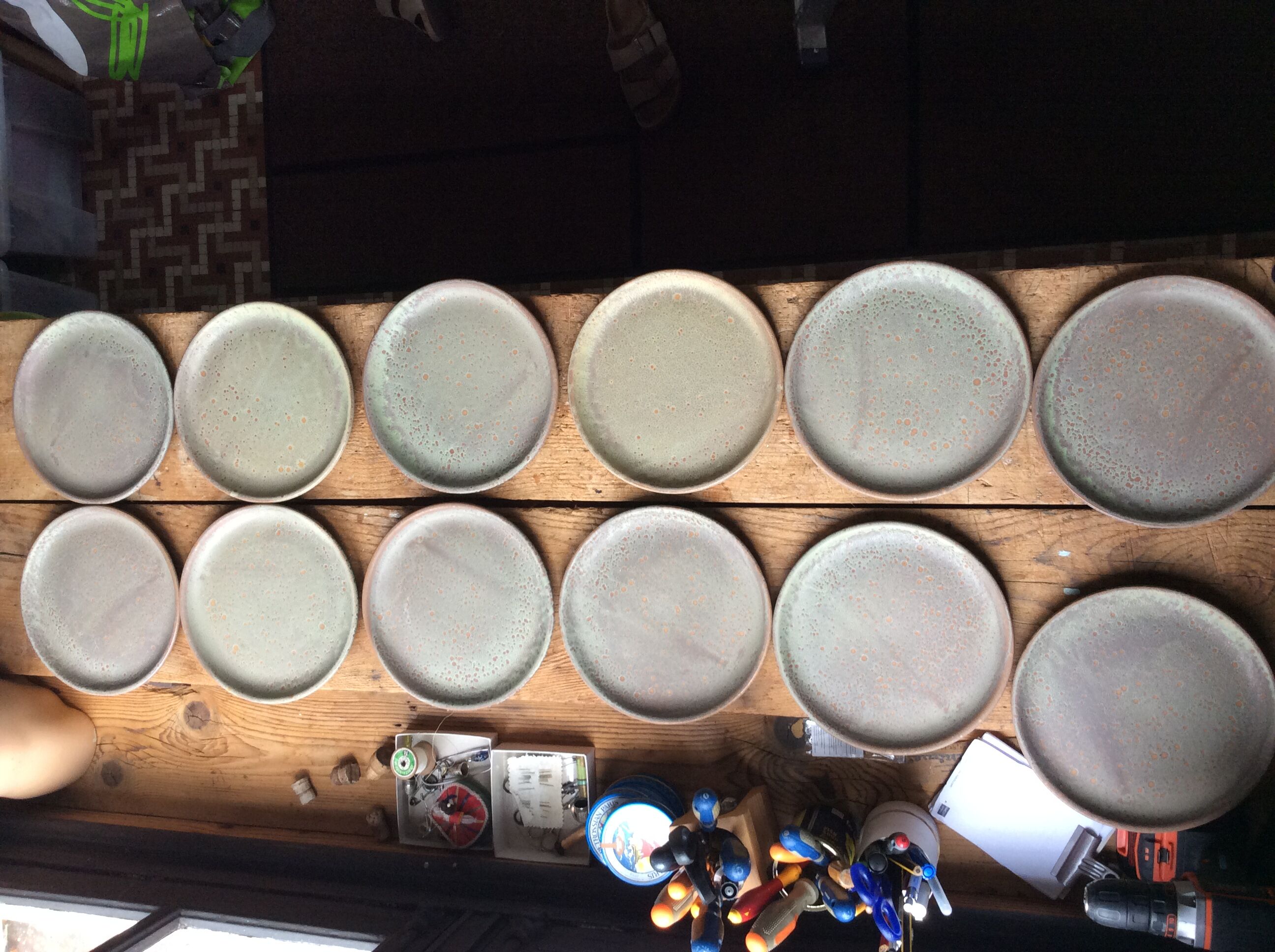 Set of 12 large and 11 small sandstone plates