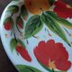Quadrifoglio dish. Italian. Fruit and flower decoration. Shimmering colors.