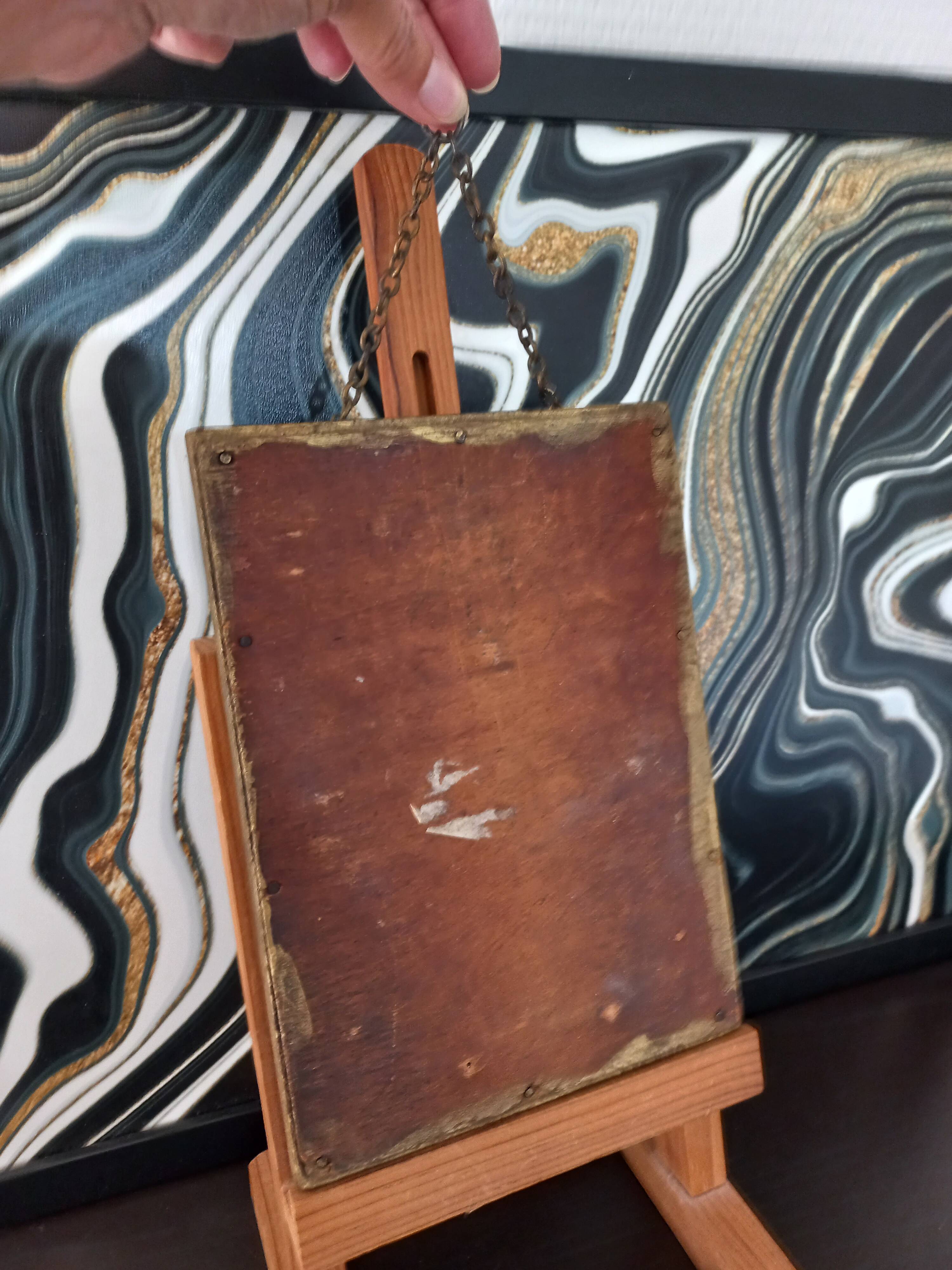 Small vintage mirror in gilded wood, bevelled glass with chain.