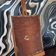 Small vintage mirror in gilded wood, bevelled glass with chain.