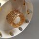 Danish hanging lamp made of glass, metal and with amber colored prisms