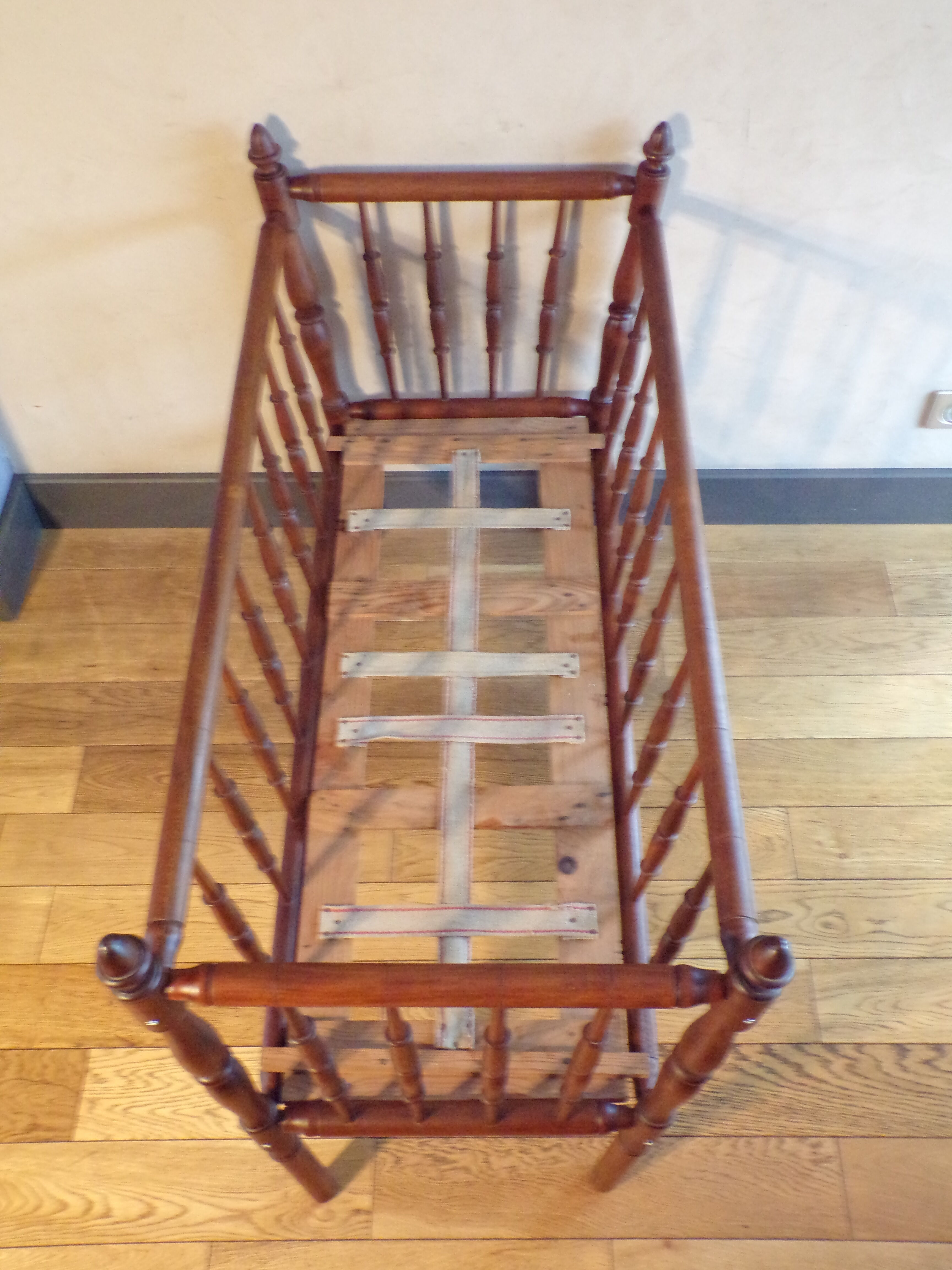 Vintage wooden child bed turned