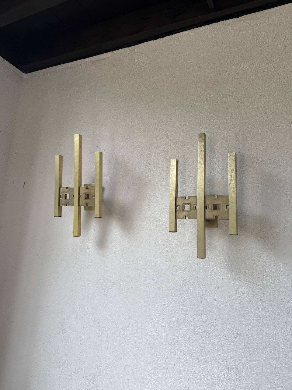 Pair of Regency brass wall lights in Italy