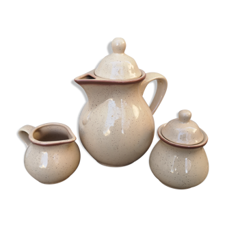 Teapot, milk pot and sugar bowl