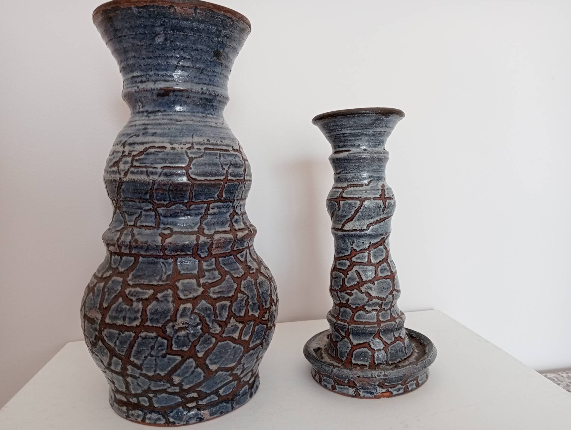 Blue glazed terracotta vase and candle holder