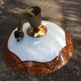 Suspension in the shape of a disc on a seventies style roller